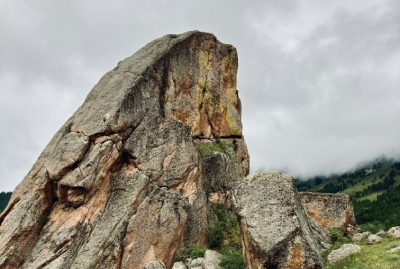 a natural rock formation that is at least 2 meters tall